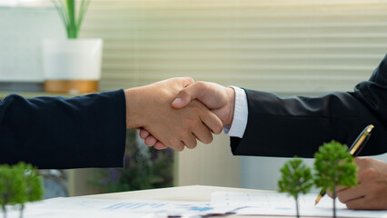 Businessman shaking hands successful making a deal. Green business. future and eco friendly....
