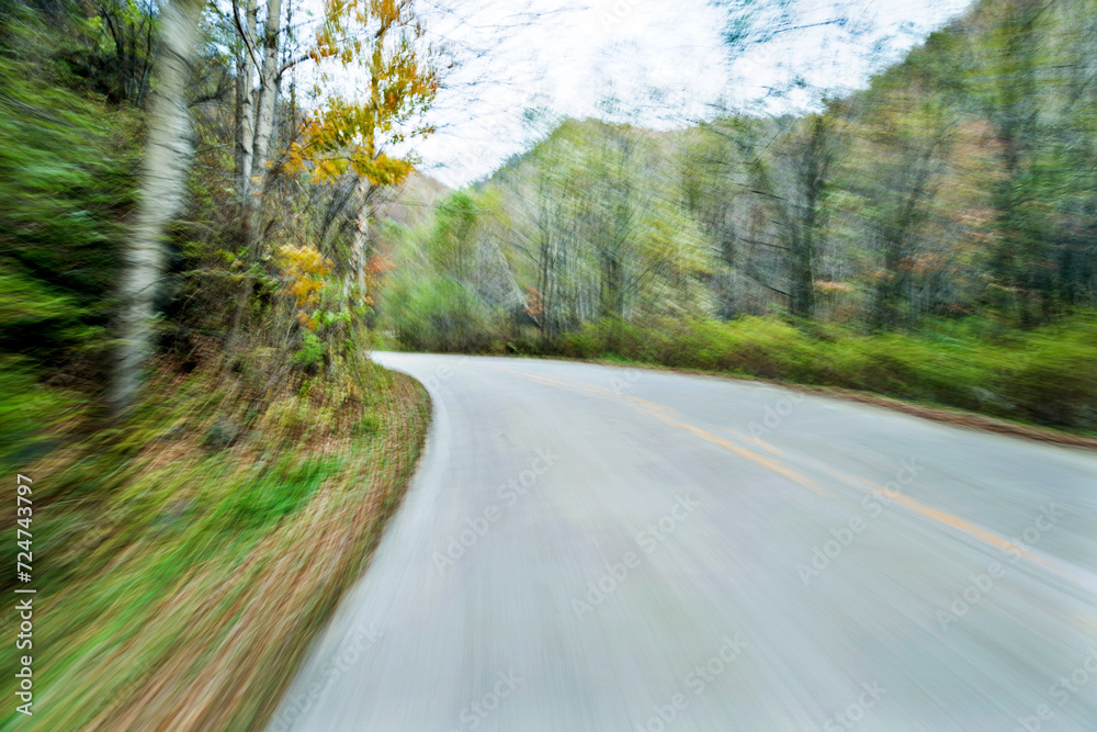 Poster empty road in motion blur