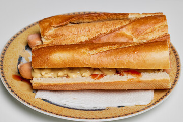 homemade hot dog on a plate in the kitchen