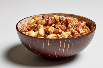 mixed hazelnuts, cashew nuts and almonds in a bowl.