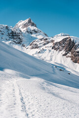 Fototapeta na wymiar Snowy mountains with sunset, Swiss Alps, Austrian Alps, Snowy mountain peaks, ski tour, backcountry