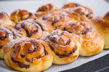 cooked baked sweet bun rolls with chocolate filling