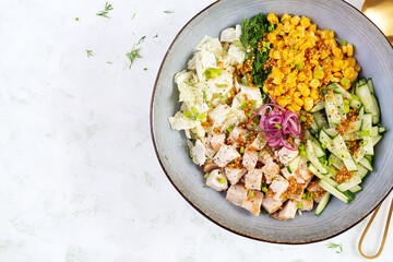 Chinese cabbage salad with chicken meat, corn, cucumber and dressing mustard. Asian food. Top view