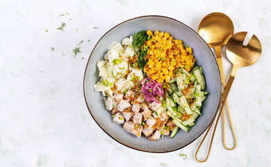 Chinese cabbage salad with chicken meat, corn, cucumber and dressing mustard. Asian food. Top view