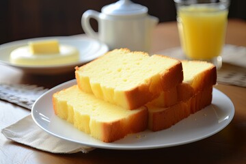 Slices of butter cake on the table, its golden exterior and tender texture promising a delicious morning indulgence.