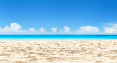 Fototapeta na wymiar Beautiful white sandy beach with blur sky as holiday summer background.