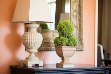 Fotobehang faux triple-ball topiary in a tuscan urn © altitudevisual