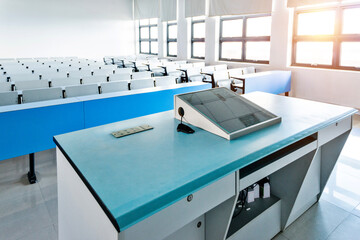 Seminar podium with blank screen in an university