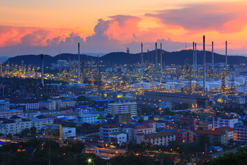 Beautiful sunset petrochemical oil refinery factory plant cityscape of Chonburi province at night , landscape Thailand 