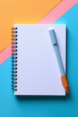 a white hardcover spiral notebook