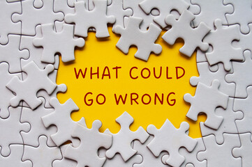 What could go wrong text on missing jigsaw puzzle. Solution concept - obrazy, fototapety, plakaty