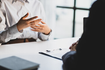 Job interview, The job applicant submits the application documents. Managers read resumes and...