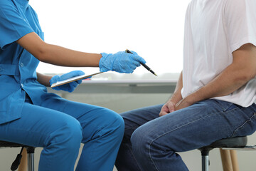 Doctor is diagnosing male erectile dysfunction and giving treatment recommendations, male health...