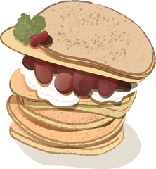 A few pancakes with cream and grapes.