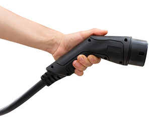Isolated black EV charging plug in female hand. Electric car charging connector. 