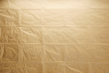 Brown crumpled paper texture with square crease