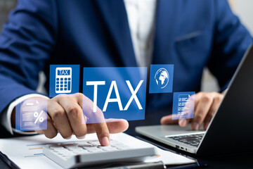 Tax and Vat concept. Government, state taxes concept. Businesman using calculator and laptop to...