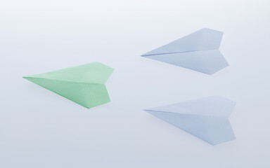 The green origami plane is the winner