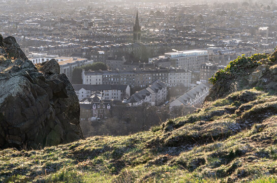 Amazing Edinburgh Cityscape and Edinburgh Castle seen from the top of Salisbury Crags. Destinations in Europe, Copy space, Selective focus.