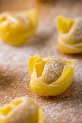 in the foreground raw tortellini Bolognese style - 724834710