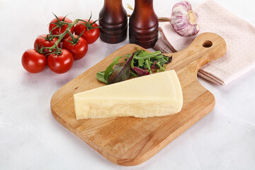 Piece Italian hard parmesan cheese