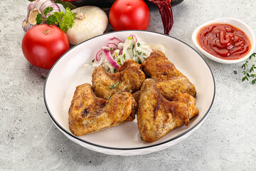 Grilled chicken wings with sauce