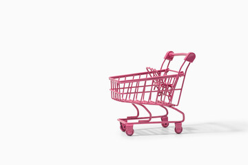 Pink shopping cart on white background - Powered by Adobe