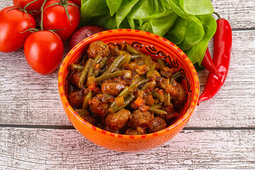 Meatball with vegetables and spices