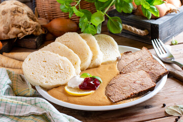 Dumpling with sirloin sauce (traditional Czech food 