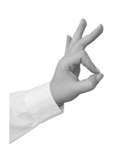 Black and white hand in a white shirt shows the Ok gesture isolated on transparent background - element for collage