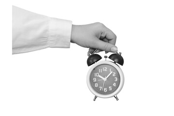 Black and white hand holding a classic alarm clock isolated on transparent background - element for...