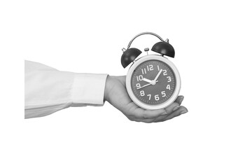 Black and white hand holding a classic alarm clock isolated on transparent background - element for collage