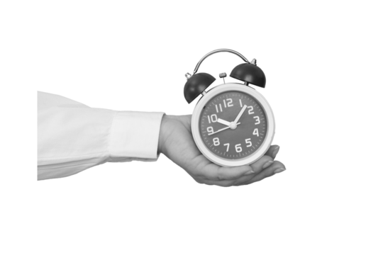 Black and white hand holding a classic alarm clock isolated on transparent background - element for collage