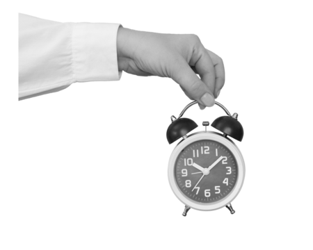 Black and white hand holding a classic alarm clock isolated on transparent background - element for collage