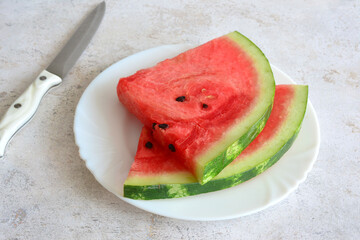 slices of watermelon on the plate close up