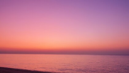 Sunset on the horizon gradient from coral orange to lavender