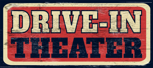 Fototapeta premium Old distressed drive-in theater sign on wood
