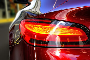 Closeup of the rear lights of a modern car. Selective focus.