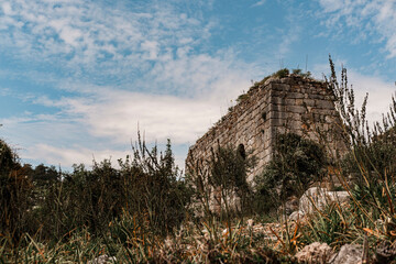 Obraz premium Ruins of Kaunos city ancient ruins , amazing natural habitat open air museam, lake landscape