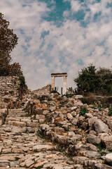 arch entrance, stone stairs, ancient ruins of historical heritage city of Kaunos