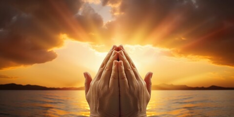 Woman hands praying for blessing from god on sunset background - obrazy, fototapety, plakaty