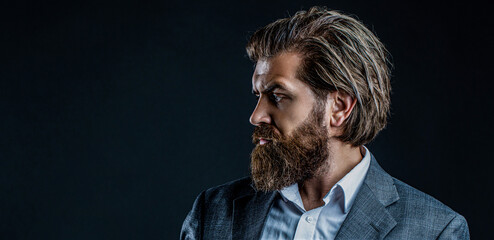Elegant handsome man in suit. Handsome bearded businessman. Portrait of handsome bearded man in...