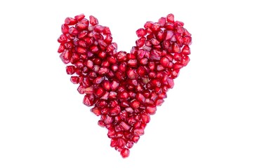 Heart Shape Created with Pomegranate Seeds Isolated on White Background