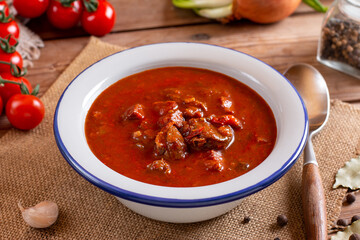 Goulash or Gulasch is a soup or stew of meat and vegetables seasoned with paprika and other spices. Perfect for recipe, article, menu book, or any cooking contents.