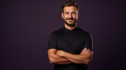 Confident young handsome barber wearing uniform pointing with hands at side isolated on purple - obrazy, fototapety, plakaty