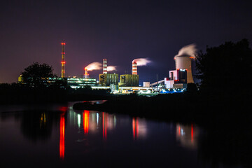 Naklejka premium Power plant Energy power station area, electrical power plant during sunset and twilight time