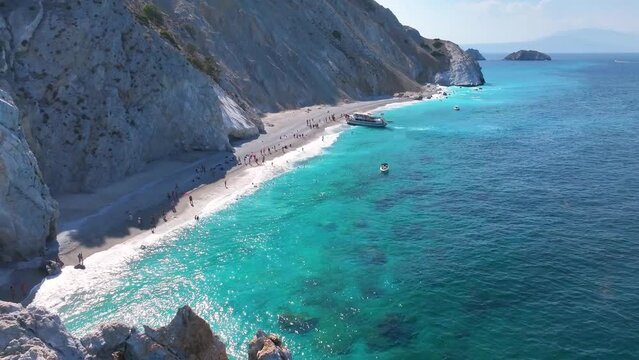 Aerial view of the beautiful Lalaria beach at Skiathos Island, Sporades, Greece, with turquoise shining sea and steep cliffs