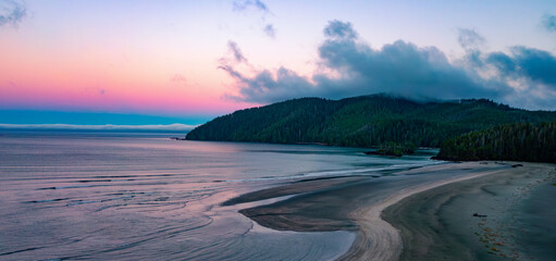 Sandy shore on Pacific Ocean West Coast. Sunrise. Vancouver Island, BC, Canada.