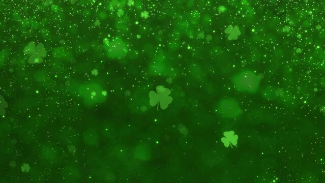 Abstract Motion Green Shiny Blurred Four Leaf Clover St. Patrick's Day With Glitter Sparkles Dust Background Seamless Loop Animation