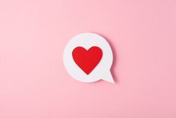 Red heart in speech bubble. Love in thoughts on pink background. Valentines Day concept, Valentines Day decoration